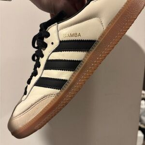 Cream and black sambas